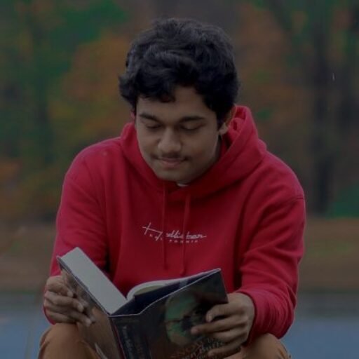 Kushal Timsina reading a book about Warren Buffet